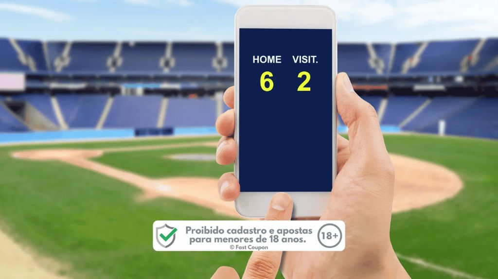 Um jogador de beisebol com seu taco e luva, pronto para rebater a bola.